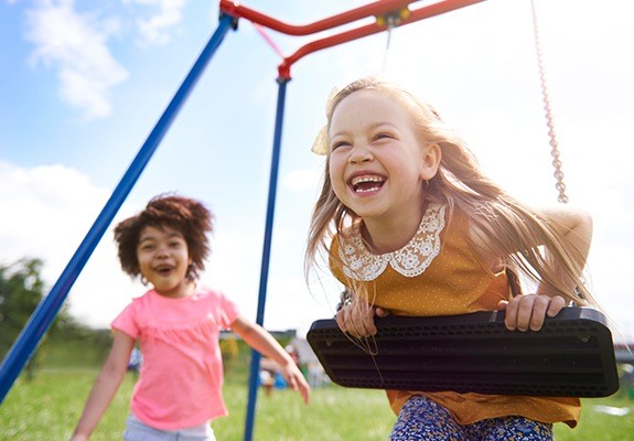 Little girls with healthy smiles after silver diamine fluoride treatment