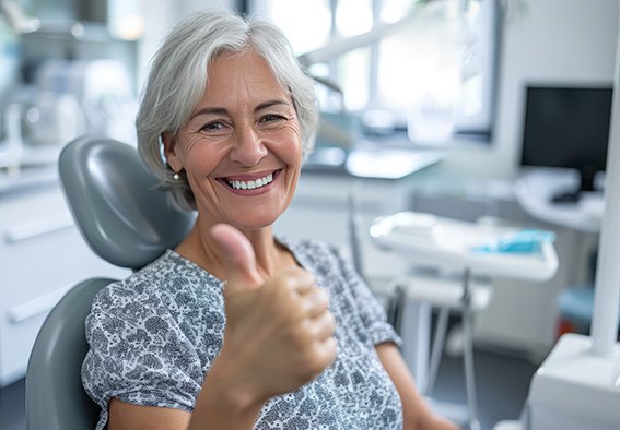 Older woman smiling in the dentist’s office