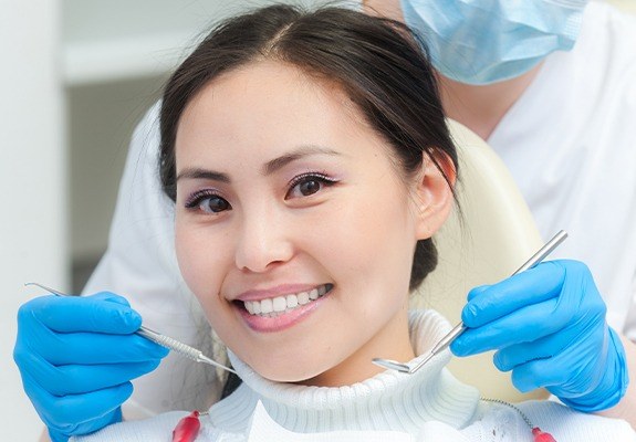 Woman receiving dental checkup