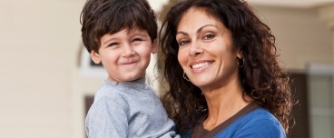 Mother taking son to children's dentistry appointment