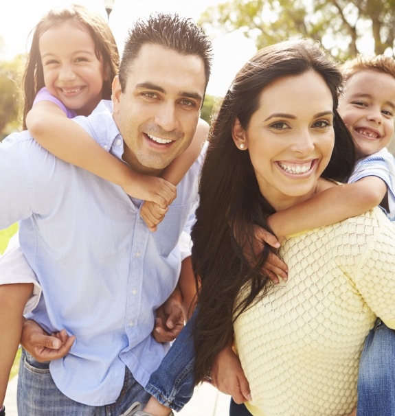 Parents and children sharing healthy smiles thanks to family dentistry in New Braunfels