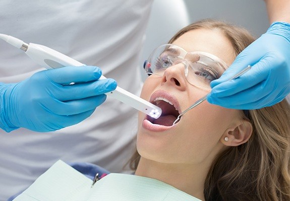 Dentist capturing intraoral images