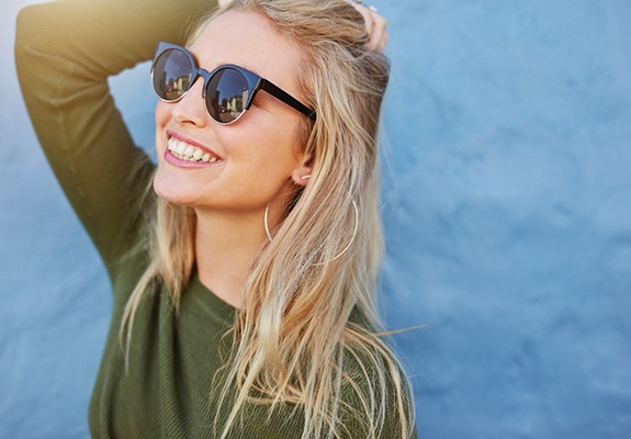 Smiling woman enjoying her veneers in New Braunfels