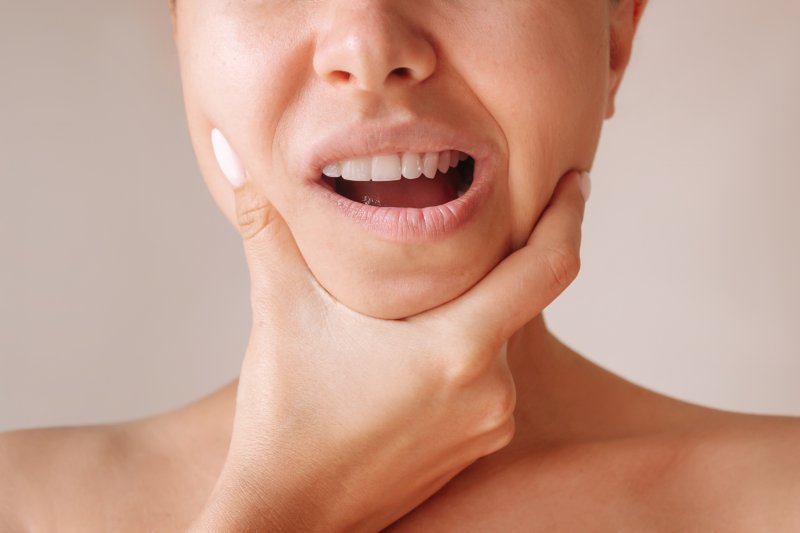 Lady has oral pain